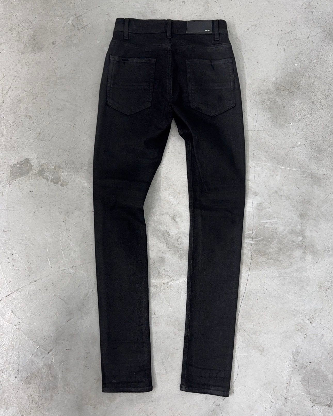 AMIRI SS19 SKINNY FIT WAXED DISTRESSED DENIM JEANS